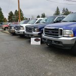 Line Up of Trucks & Business Card